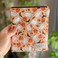 Ghost on Orange E-Reader Sleeve